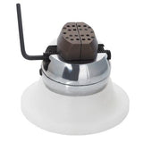 Mini engraving block with rubber base and adjustable jaws for jewelry engraving.