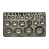 Metal dapping block with graduated round depressions for jewelry making