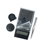 compact digital scale with calibration weights and weighing platform