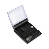 High-precision diamond scale with draft-eliminating shield